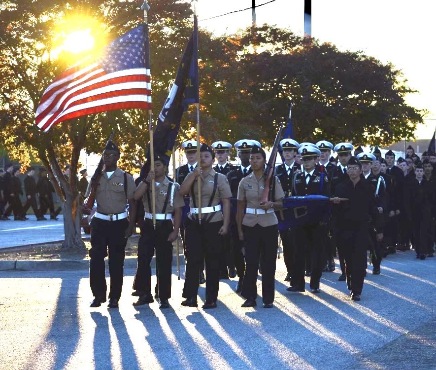 The NJROTC unit marches toward the PAHS stadium for the homecoming game.