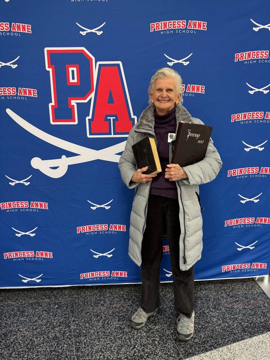 Princess Anne Alumni Faye Bailey holds “The Brothers Karamazov”, which she checked out in 1959 and returned in October. 
