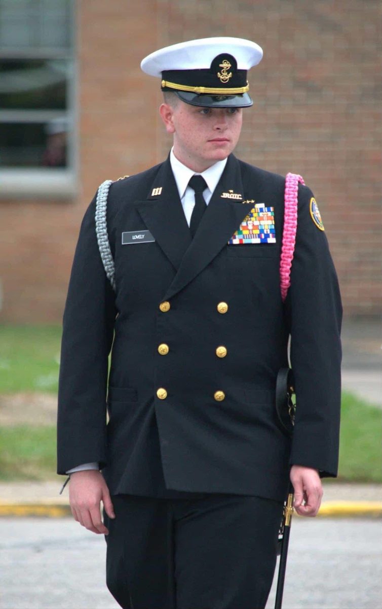 Senior Shaun Lovely in his Service Dress Blues, pauses before the Princess Anne Homecoming Parade in October of 2025. 